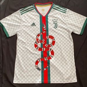 Ronaldo off white Gucci jersey.